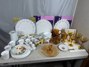 lot 87 image: Amber Depression Glass, Corning Cups, Corelle, Doilies, and More