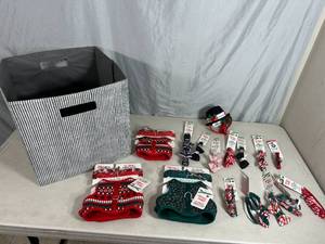 lot 107 image: Fabric Bin With Holiday Themed Pet Collars, Pet Harnesses, and More
