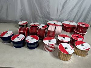 lot 129 image: 21 New Rolls of Holiday Decor Ribbon