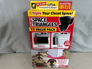 lot 228 image: New Pack of 18 Ruby Space Triangles For Closet Organization