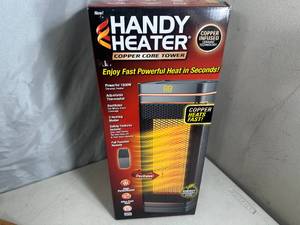 lot 260 image: New Handy Heater Copper Core Tower Heater