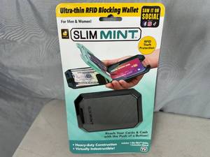 lot 342 image: New Slim Mint RFID Blocking Wallet Ultra Thin