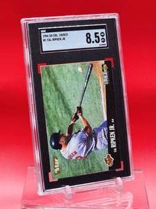 lot 200 image: 1996 Upper Deck Collectors Choice Cal Ripken Jr Card #1 Near Mint-Mint SGC 8.5