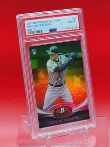 lot 78 image: 2011 Bowman Platinum Baseball Freddie Freeman Gold Rookie Card #57 Near Mint-Mint PSA 8