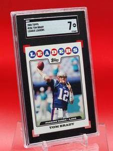 lot 41 image: 2008 Topps Football Tom Brady League Leaders Card #286 Near Mint SGC 7