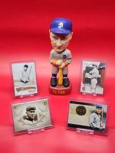 lot 106 image: Detroit Tigers HOF Great Ty Cobb Bobble Head with (4) Assorted Baseball Cards