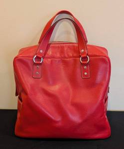lot 20 image: LL - Kate Spade Red Leather Tote with Striped Lining and Dust Bag
