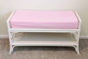 lot 52 image: LL - White Rattan Bench with Pink Cushion and Lower Shelf