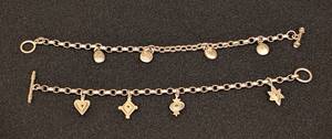 lot 101 image: LL - Pair of Sterling Silver Charm Bracelets 7 Inch
