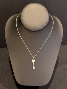 lot 102 image: LL - Tiffany & Co Sterling Silver 16 Inch Heart Key Pendant Necklace