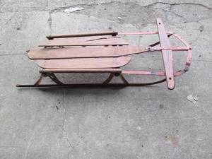 lot 71 image: Vintage wood and metal snow sled...