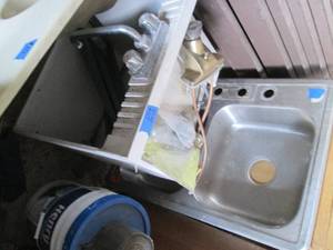 lot 82 image: Plastic utility sink with legs and ...