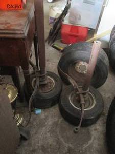 lot 90 image: 3-lawnmower style tires and rims (v...
