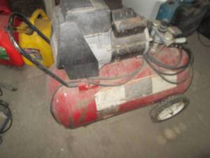 lot 5 image: Coleman Powermate 5HP 20-gallon Por...