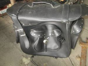 lot 16 image: Black leather motorcycle saddle bag...