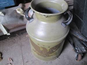 lot 23 image: Vintage metal painted milk can with...