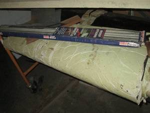 lot 135 image: Shingle shield and other roofing supplies
