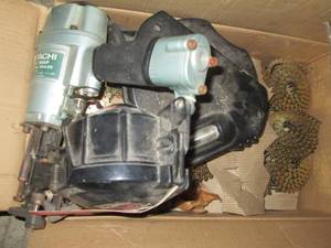 lot 136 image: Coiled rolls of roofing nails, Hita...