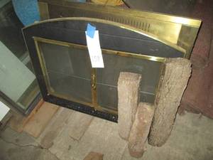 lot 139 image: Pair of metal framed fireplace scre...