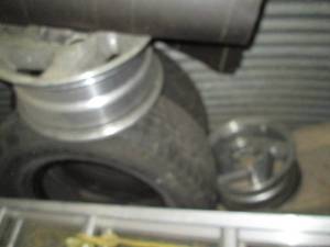 lot 144 image: 16 & 17in mismatch tires plus a pai...