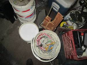 lot 180 image: 5-gallon buckets, assorted wire, ma...
