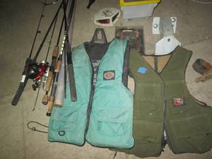lot 187 image: Fishing rods and reeks, life jacket...
