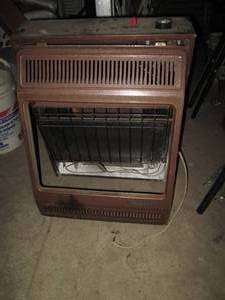 lot 200 image: 18k BTU wall mount gas heater...