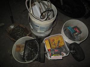 lot 223 image: multiple buckets of screws, nails a...