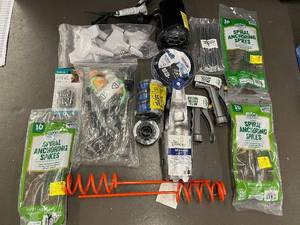 lot 55 image: Collection of Garden Tools and Accessories Including Spiral Anchoring Spikes, Nozzles, and Light