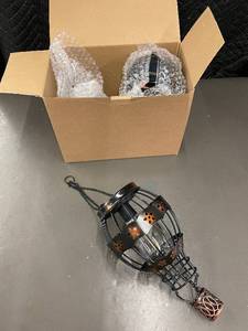 lot 57 image: Pair of Metal Flower Hot Air Balloon Solar Outdoor Lanterns