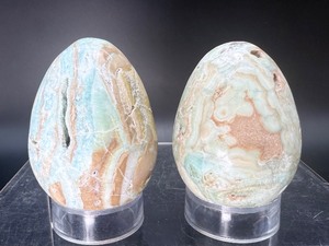 lot 64 image: Caribbean Calcite Eggs Lot of 2 311 gm  10.9 oz.is a recently discovered combination mineral of blue calcite and whitebrown aragonite.