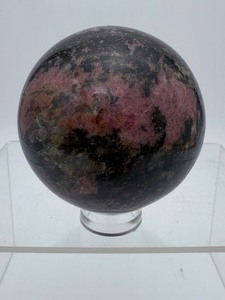 lot 59 image: Rhodonite Sphere 68 mm  627 gm  1 lb 6 oz.  3 inch