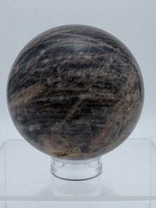 lot 6 image: Beautiful Black Moonstone Sphere 85mm, 905 gm  2lbs. Black moonstone is a dark colored variety of moonstone, a feldspar mineral.