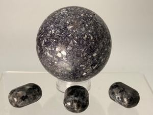 lot 135 image: Larvakite Lot of 4 Sphere and 3 polished tumbles. Sphere 68mm, 496 gm  1 lb 1.5 oz, Tumbles 54 gm 2 oz.