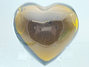 lot 139 image: Ice Obsidian Heart 168 gm.  5.9 oz. Also known as black lace obsidian or smoky obsidian is a naturally occurring, translucent to opaque form of volcanic glass.