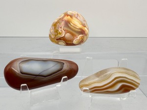 lot 128 image: Stunning Botswana Agates Polished Lot of 3 Total Weight 297 gm.  10.4 oz. Are a type of banded agate from Africa, prized for their beautiful, tight and parallel bands ini color
