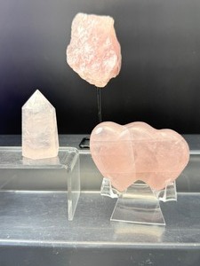 lot 110 image: Rose Quartz Lot of 3 Rough Chunk on stand, small tower and double heart   Double Heart 174 gm.  6.1 oz.  Rough chunk on stand 157 gm.  5.5 oz.  Small tower 52 gm.  1.8 oz.  Total Weight 385 gm.  13.5 oz.
