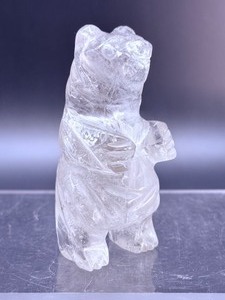 lot 14 image: Cute Clear Quartz Bear 141gm  4.9oz.  3 tall. Stands independently