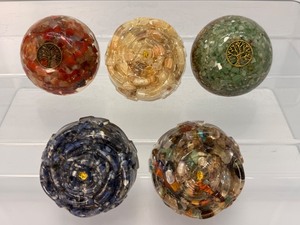lot 230 image: Lot of 5 Orgonite Items  Made of resin, crystals & metal shavings. Moonstone, sodalite, mixed stones, carnelian and aventurine