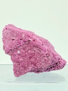 lot 132 image: Honeycomb Ruby Chunk 353 gm.  12.4 oz. is a trade name for a lab-created synthetic) corundum product, nota naturally occurring gemstone.  Popular in crystal shops due to its unique appearance and is chemically identical to natural ruby.