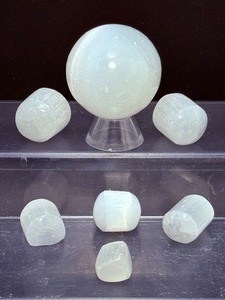 lot 178 image: Selenite Lot of 3 sphere and 6 nuggets.sphere 55mm, 175 gm  6.1 oz.  6 nuggets 128 gm  4.5 oz  Total Weight 183 gm  10.6 oz
