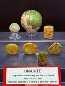 lot 175 image: Unakite Polished Lot of 7 2 sphere, 3 palmstones and 2 square tumbles. sphere 62mm, 378 gm13.2 oz.  sphere 27mm, 37 gm  1.3 oz.  3 palmstones 72 gm  2.5 oz.  2 square tumbles 72 gm  2.5 oz.  Total Weight 12 kilo or 559 gm  1 lb. 3.5 oz.