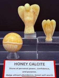 lot 179 image: Honey Calcite Polished Lot of 3 2 angels and a sphere. large. angel137 gm  4.8 oz  small angel 38 gm  1.3 oz.  sphere 63mm, 174 gm  6.2 oz  Total Weight 360gm  12.3 oz