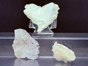 lot 177 image: Selenite ( Angelwing & Fishtail) Lot of 3.  Heart shape 113 gm  3.9 oz.  Thin flat 21 gm  .7 oz  Palm Shahped Angelwing 26 gm  ,9 oz.  Total Weight 159 gm  5.6 oz.