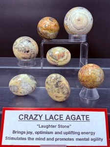 lot 193 image: Crazy Lace Agate Polished Lot of 7  sphere 47mm 165 gm  5.8 oz., sphere 43mm 134 gm  4.6 oz., sphere 38mm 89 gm  3.1 oz., sphere 38mm, 93 gm  3 oz. Total Weight 592 gm  1 lb. 5 oz.
