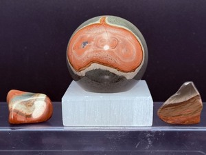 lot 207 image: Polychrome Jasper Polished Lot of 3 sphere 62mm, 377 gm  13.2 oz  Stand 221 gms  7.8 oz  Tumbles 26 gm  .9 oz  Total Weight 618 gm  1 lb. 5.7 oz.