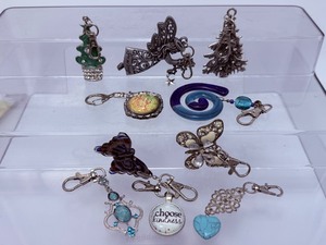 lot 294 image: Hanging Charms 3 Christmas, 2 butterflies and 5 misc. Great for backpacks, purses, keychains, cars, windows, stocking stuffers & more