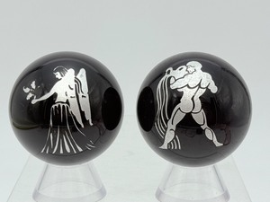 lot 244 image: Black Obsidian Horoscope Spheres Lot of 2 Aquarius 47mm, 160 gm  5.7 oz., Virgo 47mm, 165 gm  5.8 oz