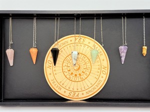 lot 254 image: Pendulum Lot of 7 with Yes, No, Maybe Wood Grid lepidolite, rainbow moonstone, rose quartz, picture jasper, black obsidiain, peach moonstone & new jade