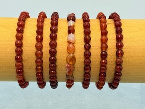 lot 180 image: Lot of 7 Gemstone Carnelian Bead Bracelets
